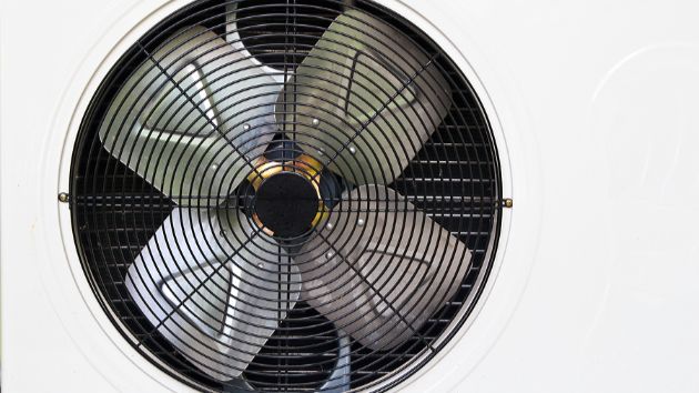 Fan inside of an AC unit.