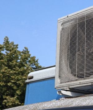 Air conditioning unit attached to a mobile home.