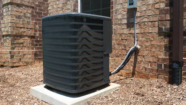 When Is The Best Time Of Year To Replace An AC Unit? Air conditioning unit, sitting outside of a home.